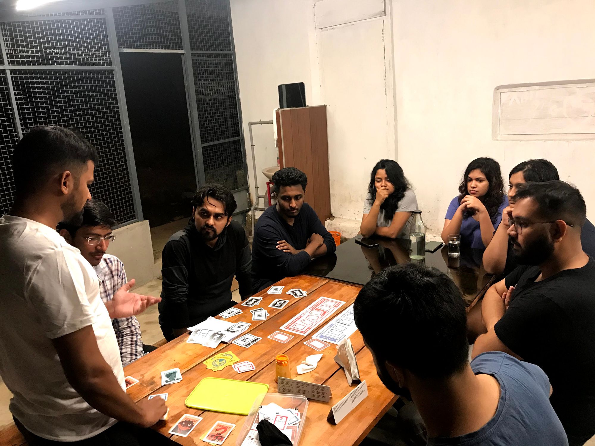 Basim preparing everyone for a round of Secret Hitler - a social deduction game